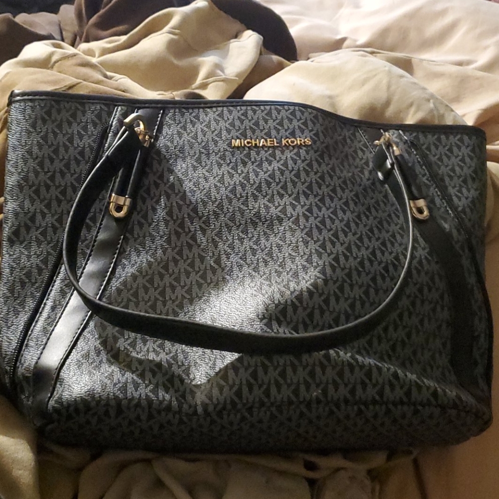 Michael Kors monogram handbag.